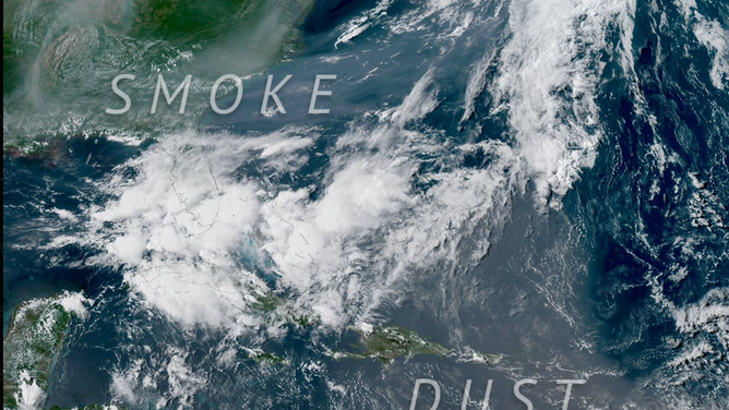 This NOAA GOES satellite image produced by CSU/CIRA shows the wildfire smoke and the dust haze over the U.S. this week. 
